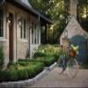 Hinkley Bromley Small LED Wall Mount Lantern, Museum Black, 120V, Add Security to Porches, Patios, Exterior Spaces with Durable LED Outdoor Lighting, Includes 2-5w Cand. LED Lamps, 2360MB-LL view 2