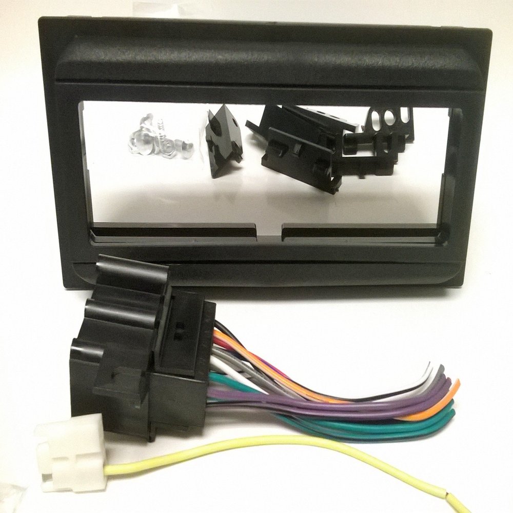 Dash kit and Wire Harness for Installing a New Single Din Radio into a Pontiac A6000 (1982-1989), Bonneville (1987-1991), Fiero (1984-1988), Firebird Trans AM (1982-1989) ..