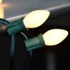 GOOTHY 25 Pack C7 White Replacement Bulbs, Ceramic C7 Incandescent Light Bulbs for Christmas Outdoor Patio Indoor String Lights, C7/E12 Candelabra Base, 5 Watt Night Light Bulbs- White view 4