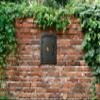 Qualarc MAN-1406-BL Manchester Column Mount Mailbox with "Decorative Agave Logo" in Black view 2