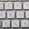 MAC Korean Keyboard Sticker with Orange Lettering ON Transparent Background view 1
