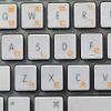 MAC Korean Keyboard Sticker with Orange Lettering ON Transparent Background view 3