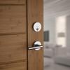 Kwikset 92580-003 258 Uptown Low Profile Slim Round Modern Contemporary Single Cylinder Deadbolt Door Lock featuring SmartKey Security Venetian Bronze view 3