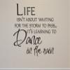 Life Isn't About Waiting for The Storm to Pass...It's Learning to Dance in The Rain Wall Decals Stickers, Black, 24" view 1