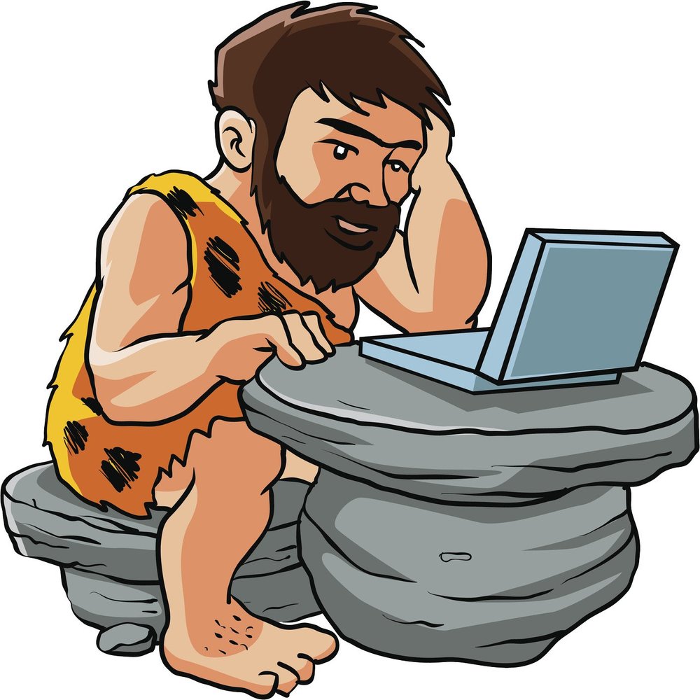 Caveman on Laptop Oxymoron Cartoon Vinyl Decal Sticker (12" Wide)