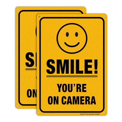 (2 Pack) Smile You're On Camera Video Surveillance Sign - 10 x7 Inches .040 Rust Free Heavy Duty Aluminum - Indoor or Outdoor Use for Home Business CCTV Security Camera,UV Protected & Reflective