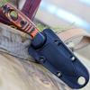 ESEE Xancudo S35V Fixed Blade Knife with Black Sheath, Outdoor Knife with 3D Contoured Handle, Made in USA (Orange/Black G-10 w/Hole) view 4