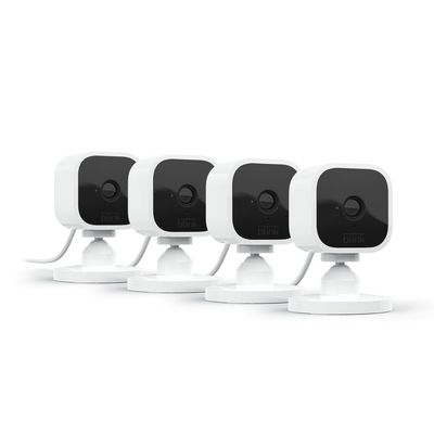 Blink Mini - Compact indoor plug-in smart security camera, 1080p HD video, night vision, motion detection, two-way audio, easy set up, Works with Alexa  4 cameras (White)