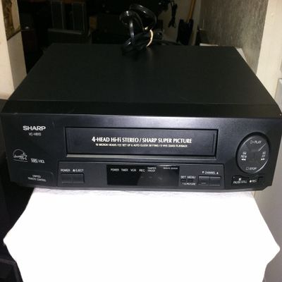 Sharp VC-H810 VCR Video Cassette Recorder 4-Head Hi-Fi Stereo VHS Player. VHS HQ. Sharp Super Picture. Works Great. Energy Saver Star Rated Device. (Renewed)