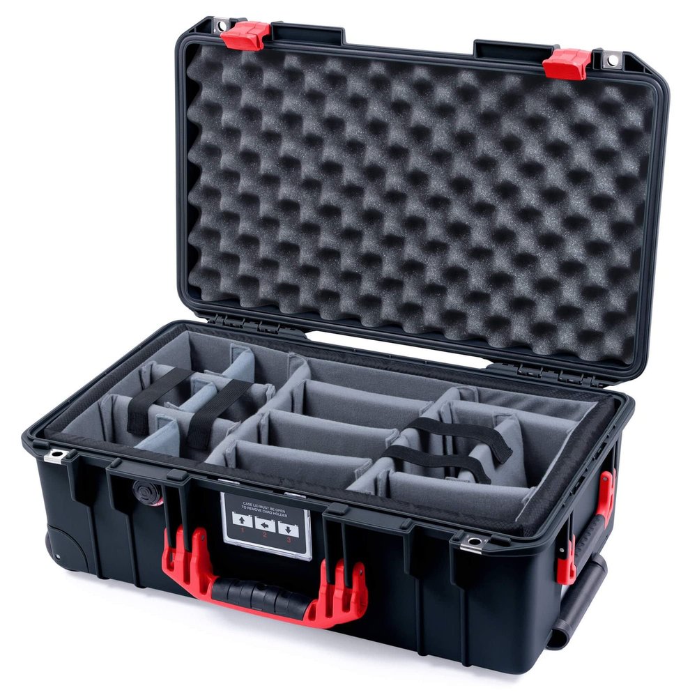 Black Pelican 1535 case, with red Handles & latches. Comes with Grey Padded dividers.
