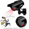 PreZiouz Solar Powered Dummy Security Camera, Bullet Fake Security Cameras, Simulated Surveillance System with Red LED Light and CCTV Stickers for Home Businesses Indoor/Outdoor (4 Packs, Black) view 3
