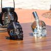 Sunnydaze Grinning Skull Glass Tabletop Torches - Outdoor Patio Lighting - Includes Wicks and Attached Snuffers - Set of 4 Refillable Torches - 2 Clear and 2 Black view 4