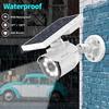 OOSSXX Solar Powered Outdoor Wireless Simulated Cameras Fake Camera Wire Free Solar Motion Light Motion Sensor Floodlights Spotlight view 3