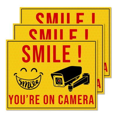 GOLEEX Pack 4 Pcs Smile You're On Camera Stickers Security Notice Bumper Sticker Outdoor Window Automotive Exterior Decal Reflective Video Surveillance Label for House Decoration
