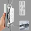 TOLUON Adhesive Socket Fixer Traceless Punch-Free Self-Adhesive Non-Slip Free Adjustment Organizer Wall-Mounted Power Strip Holder Rotary Socket Hook Socket Fixer White B view 3