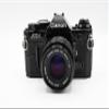 Canon AE-1 Program 35mm SLR Camera with 50mm 1:1.8 Lens (Black) (Renewed) view 1