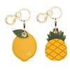 BORKUANA 2 Pack Leather Keychain Holder Case Compatible with Apple AirTag, Cute Protective Air Tag Cover with Keychain Ring, Anti-Scratch Finder GPS Tracker Case for Wallet Keys(Pineapple&Lemon) view 1
