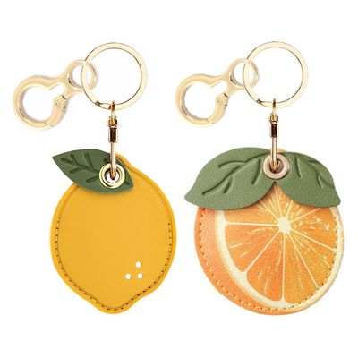 BORKUANA 2 Pack Leather Keychain Holder Case Compatible with Apple AirTag, Cute Protective Air Tag Cover with Keychain Ring, Anti-Scratch Finder GPS Tracker Case for Wallet Keys(Lemon&Orange)