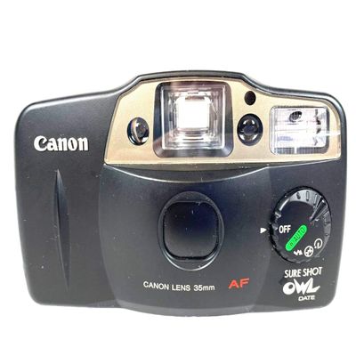Canon SureShot Owl 35mm Point and Shoot Film Camera with built-in flash and Film wind/rewind mechanism. Powered by two AA batteries. Takes Both Color & B&W film (Renewed)
