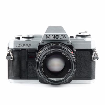 Minolta X-370 35mm SLR Film Camera with A Standard Minolta MD Manual Focusing Zoom Lens (Renewed)