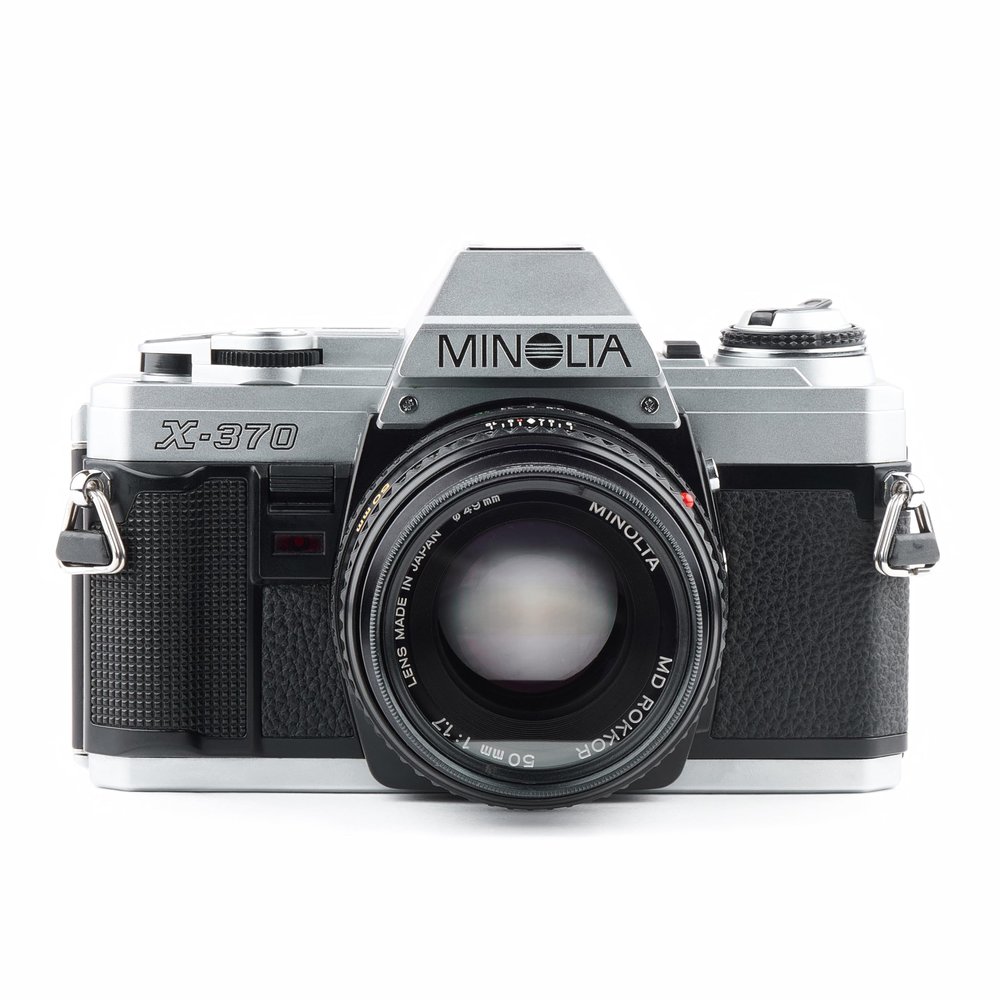 Minolta X-370 35mm SLR Film Camera with A Standard Minolta MD Manual Focusing Zoom Lens (Renewed)