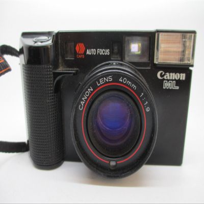 Canon AF35ML Point and Shoot 35MM Film Camera with built in Flash and autofocu lens. Power rewinder and film loader, 40MM F1.9 Canon lens. (Renewed)