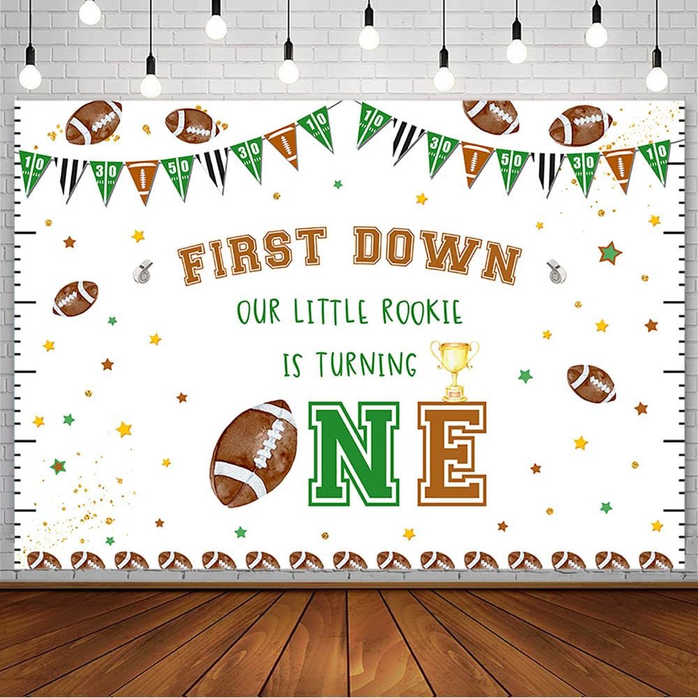 AIBIIN 8x6ft Football 1st Birthday Backdrop Our Little Rookie is Turning One Photography Background Football Party Decorations First Down Newborn Cake Table Banner Photo Studio Prop