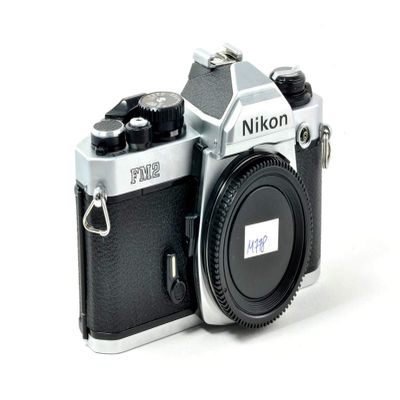 Nikon FM2 35MM SLR Film Camera with Titanium Shutter Manual focus FX Nikon Lens system (Renewed)