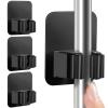 DOMAXCAI 8 Pack Broom Holder Wall Mount, Improved Super Anti-Slip Mop and Broom Holder Wall Mount, Broom Hanger Gripper for Kitchen, Bathroom, Closet, Garden Garage, Black view 1