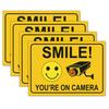 4 Smile You're on Camera Stickers for Home, 10 X 7 Inch Self-Adhesive Vinyl Decal, Video Surveillance Signs Outdoor, Security Camera Signs for Business, Driveway Alert, and CCTV. view 1