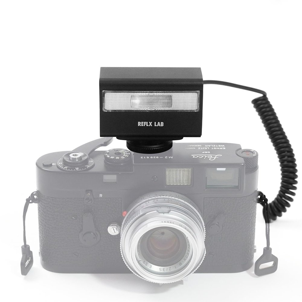 eTone Simple Flash Camera Top Compact Flash Compatible with Film and Digital Cameras.Included Flash Cord