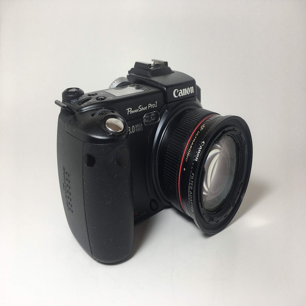 Canon Powershot Pro 1 8MP Digital Camera 7X Optical Zoom 7.2-50.8MM 2.4-3.5 L Lens (Renewed)