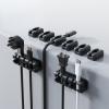 8 Pack Black Magnetic Cable Clips, Silicone Cable Management Under Desk with Magnetic Base for Iron Things, Phone Charger Cord Holder for Nightstand, Desk, Car, Wall view 1