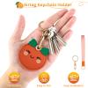 Airtag Keychain Holder - Cute Kawaii Faux Leather Case 3-in-1 with Hidden Keychain Cover, Detachable Wrist Strap & Anti-Loss Hand Band, Anti-Scratch Protective Case for Airtag (Orange) view 3