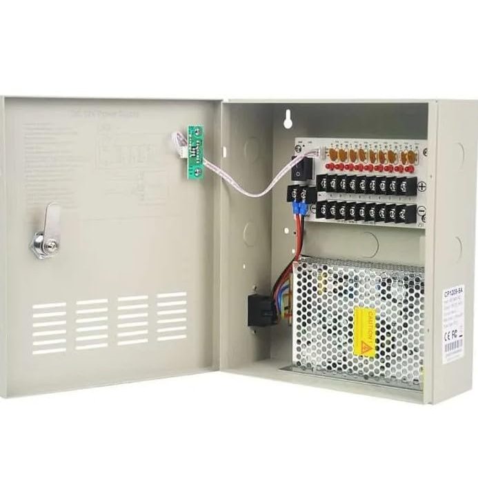 CP1209-10A 12V DC 9-Channel Power Distribution Box  10 Amp Output, 110V AC Input, Surge Protected, Regulated and Filtered, PTC Fuse Protection, LED Indicators, Durable Metal Enclosure