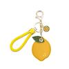 Cbyayistic Premium Leather Holder with Keychain Compatible with Air Tag - Full Coverage Protective Case for Air Tag, Anti-Loss Key Ring Accessories (Lemon) view 1