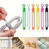 100pcs Silicone Multifunctional Cable Organizer Winder Storage Holder Bag with Zip Tie, Twist, and Clip Functions(Orange) view 2