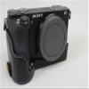 A6500 Case, Genuine Leather Camera Case Bottom Opening Body Half Base Cover for Sony Alpha A6500 with Hand Wrist Strap (Black) view 2