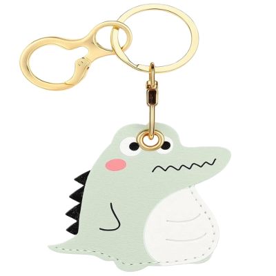 The leather keychain case is compatible with AirTag, featuring a keychain ring and a GPS key tracking box. (Blue Dinosaur)