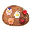 MC Fashion PU Leather Keychain Holder Compatible with AirTag, Cute Fruit-themed Animal Charm GPS Tracker Holder (Banana+Puppy) view 3