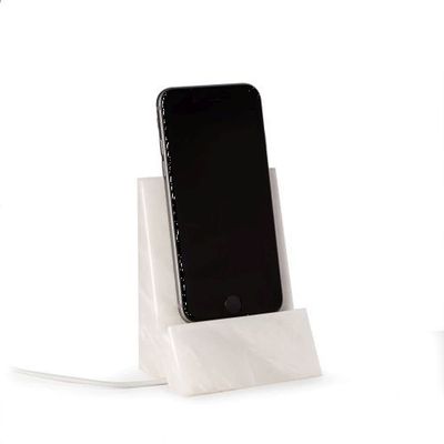 White Marble Desktop Phone/Tablet Cradle with a Pass-Thru Hole for Charging Cable.