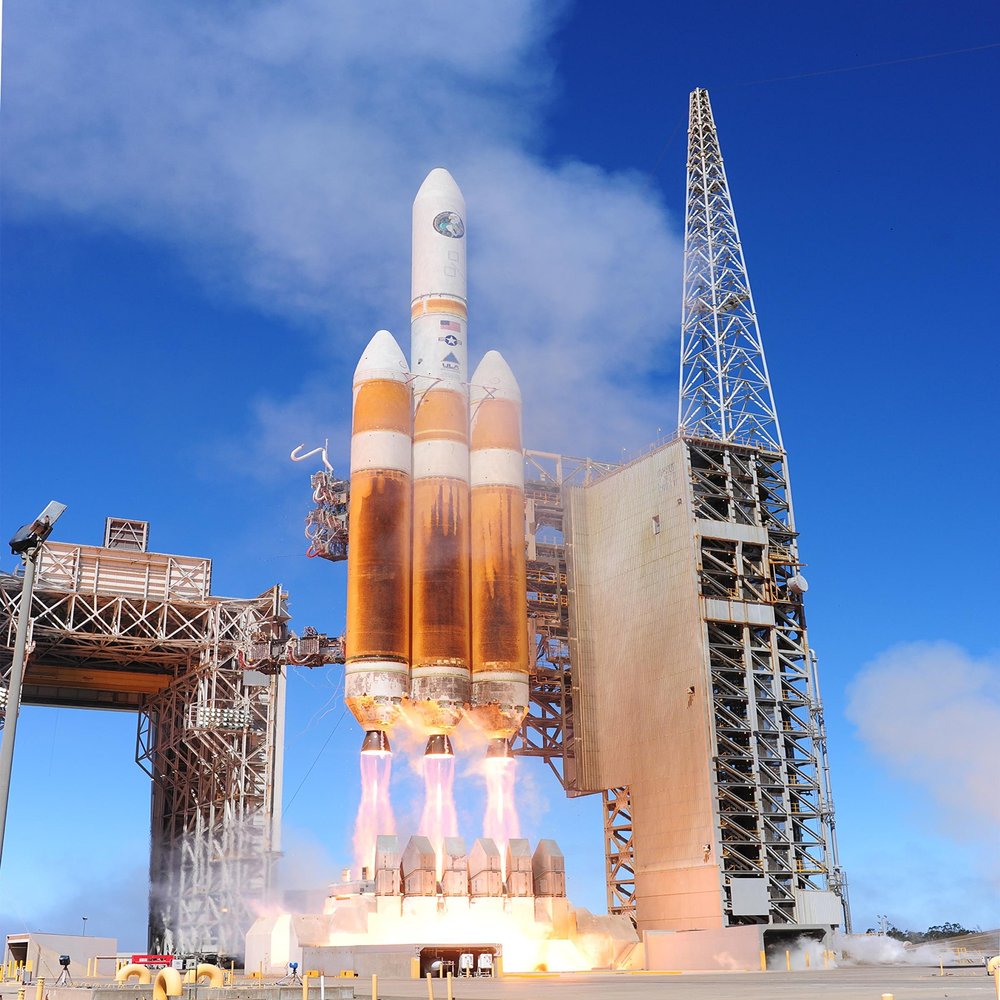 Home Comforts A United Launch Alliance Delta IV-Heavy rocket carrying a National Reconnaissance Office payload lau Laminated Poster Print-20 Inch by 30 Inch Laminated Poster